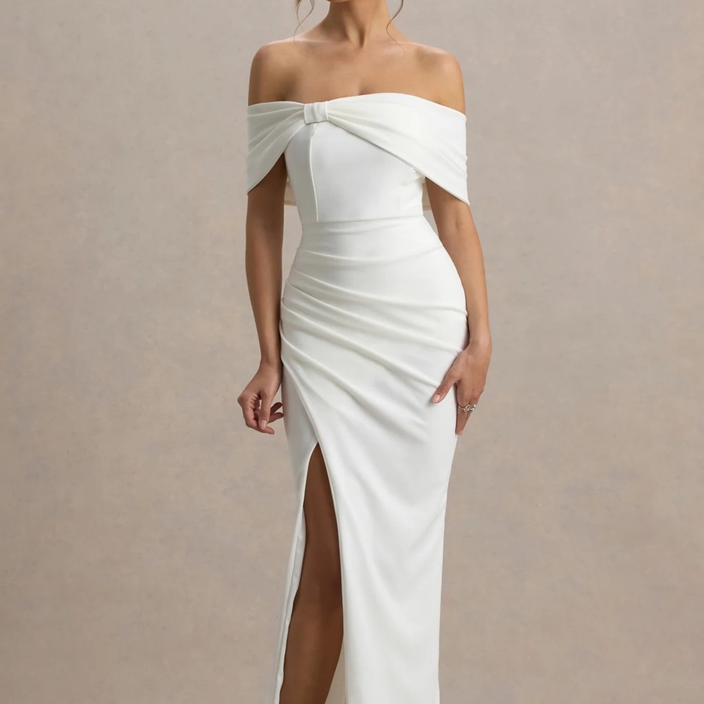 Club L London: EVA
WHITE BARDOT BOW DETAIL MAXI DRESS WITH THIGH SPLIT